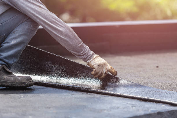 Professional Waterproofing technician working in Bladensburg, OH